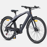 A matte dark gray electric bicycle with black components, shown from a three-quarters front angle on a light gray background.